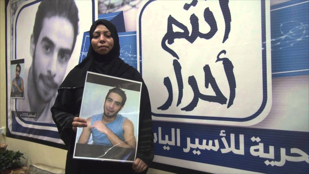 Mother of Elias Al-Mulla Carrying his photo